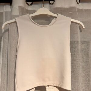 Elegant Cream Sleeveless Top with cute back